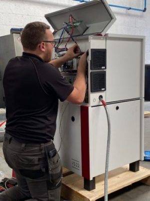 airmac employee fraser providing maintenance on a gardner denver VS22 lubricated rotary screw air compressor